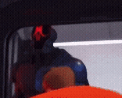 A Cartoon Character Is Standing In Front Of A Window With A Red Light On His Head . GIF
