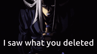 A Cartoon Character Is Standing In The Dark With The Words `` I Saw What You Deleted '' Written Below Him . GIF