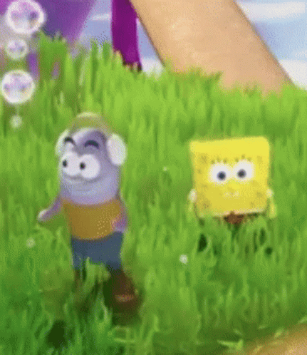 A Cartoon Character Is Standing In The Grass With A Spongebob Squarepants Character . GIF