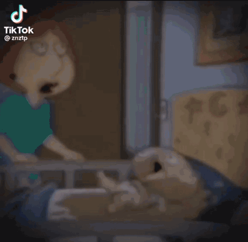 A Cartoon Character Is Standing Next To A Cartoon Character In A Bed . GIF