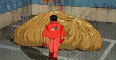 A Cartoon Character Is Standing Next To A Red Motorcycle Covered In A Yellow Cloth . GIF