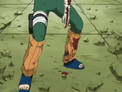 A Cartoon Character Is Standing On A Rocky Floor With Blood On His Leg . GIF