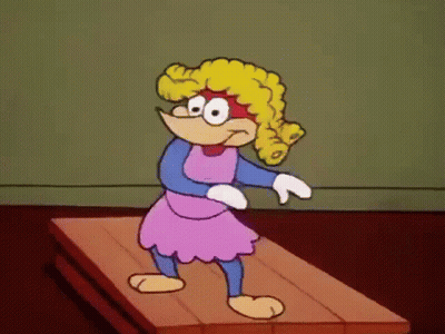 A Cartoon Character Is Standing On A Wooden Surface GIF
