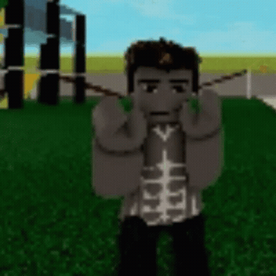 A Cartoon Character Is Standing On Top Of A Lush Green Field . GIF