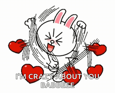 A Cartoon Character Is Surrounded By Red Hearts And Says `` I 'M Crazy About You Babeee '' . GIF