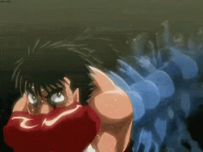 A Cartoon Character Is Swimming In The Water While Wearing Boxing Gloves And A Blue Shirt . GIF