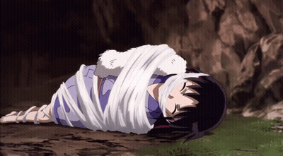 A Cartoon Character Is Tied Up With A White Ribbon GIF