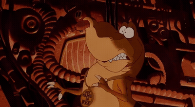 A Cartoon Character Is Wearing A Necklace With A Lion On It GIF