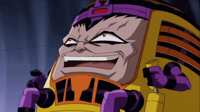 A Cartoon Character Is Wearing A Purple Helmet And A Yellow Vest With The Letter T On It GIF