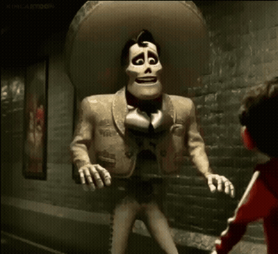 A Cartoon Character Is Wearing A Sombrero And Standing Next To A Child . GIF