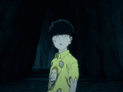 A Cartoon Character Is Wearing A Yellow Shirt With Monkey Faces On It GIF