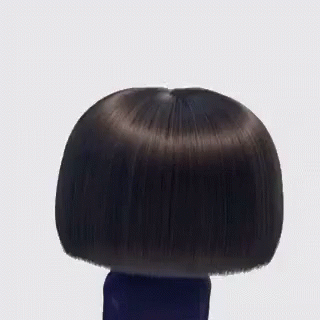 A Cartoon Character Is Wearing Glasses And A Wig . GIF