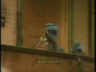 A Cartoon Character Laughs Evilly While Looking Out Of A Window GIF