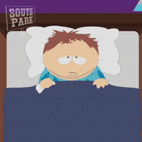 A Cartoon Character Laying In A Bed With A Sign That Says South Park GIF