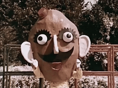 A Cartoon Character Made Out Of A Potato With A Big Smile On His Face GIF
