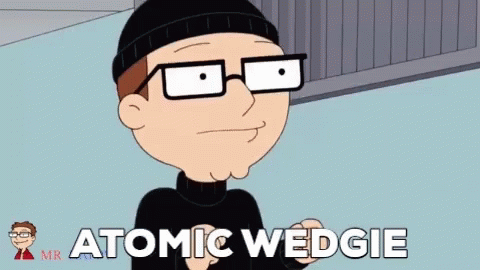 A Cartoon Character Named Atomic Wedgie Is Wearing Glasses And A Beanie GIF