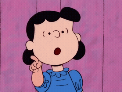 A Cartoon Character Named Lucy Is Pointing Her Finger Up GIF