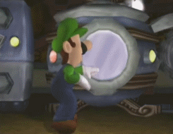 A Cartoon Character Named Luigi Is Standing In Front Of A Machine In A Video Game . GIF