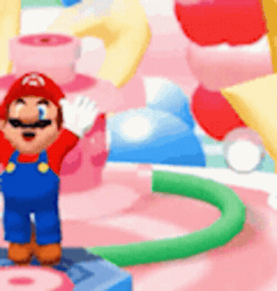 A Cartoon Character Named Mario Is Standing In Front Of A Pink And Blue Candy Land . GIF