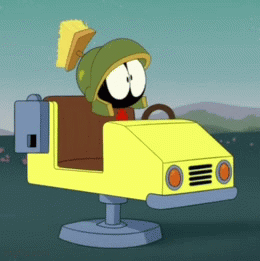 A Cartoon Character Named Marvin The Martian Is Driving A Yellow Car GIF