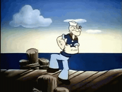A Cartoon Character Named Popeye Is Standing On A Dock . GIF