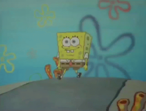 A Cartoon Character Named Spongebob Squarepants Is Standing On A Road GIF
