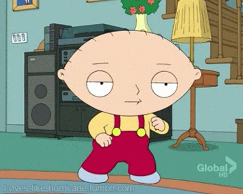 A Cartoon Character Named Stewie From Family Guy Standing In A Living Room GIF