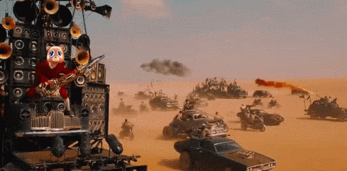 A Cartoon Character Playing A Saxophone In A Desert Scene GIF
