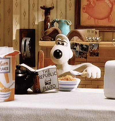 A Cartoon Character Reading A Book Called The Republic Pluto GIF