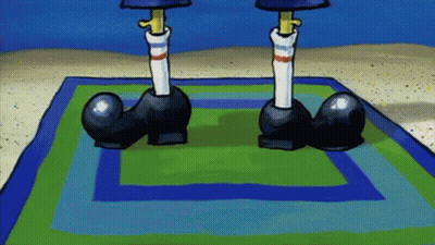 A Cartoon Character 'S Feet Are Standing On A Rug GIF