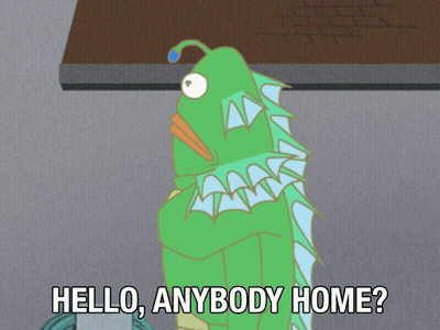 A Cartoon Character Says Hello Anybody Home In Front Of A Brick Building GIF