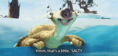 A Cartoon Character Says " Hmm That 'S A Little Salty " In The Water GIF