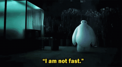 A Cartoon Character Says " I Am Not Fast " In A Dark Room . GIF