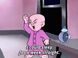 A Cartoon Character Says " I Could Sleep For A Week Straight " In Front Of An Alarm Clock GIF