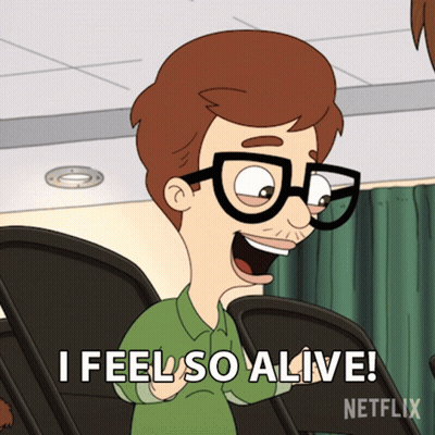 A Cartoon Character Says " I Feel So Alive " While Wearing Glasses GIF