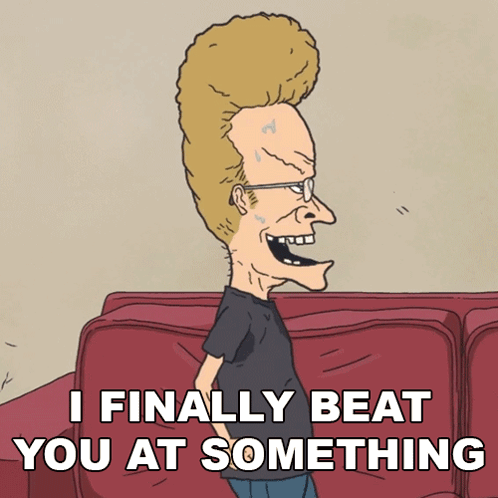 A Cartoon Character Says " I Finally Beat You At Something " While Standing Next To A Red Couch GIF
