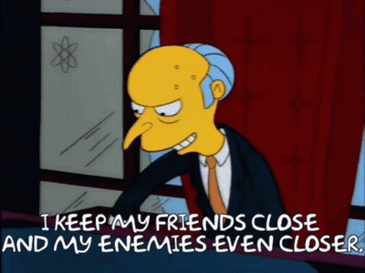 A Cartoon Character Says " I Keep My Friends Close And My Enemies Even Closer .. " GIF
