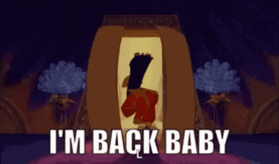 A Cartoon Character Says I 'M Back Baby While Standing In A Doorway GIF