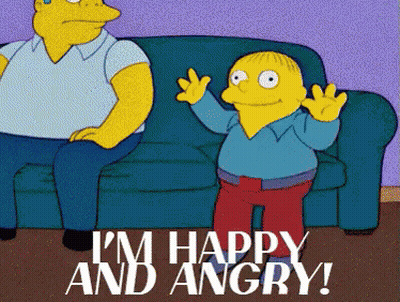 A Cartoon Character Says I 'M Happy And Angry While Sitting On A Couch GIF