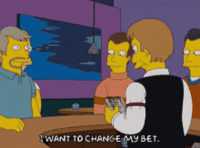 A Cartoon Character Says I Want To Change My Bet In Front Of A Group Of Men GIF