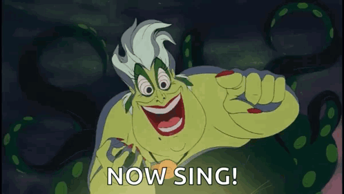 A Cartoon Character Says " Now Sing " In A Dark Background GIF