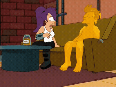 A Cartoon Character Sits On A Couch Next To A Table With A Jar Of Honey On It GIF