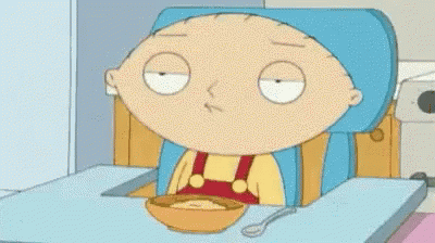 A Cartoon Character Sitting At A Table With A Bowl Of Cereal And A Gun . GIF