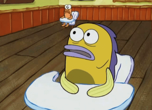 A Cartoon Character Sitting In A High Chair GIF