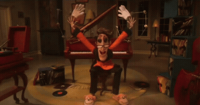 A Cartoon Character Sitting In Front Of A Piano With His Hands Outstretched GIF