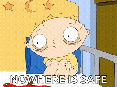 A Cartoon Character Sitting On A Bed With The Words Nowhere Is Safe GIF