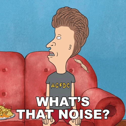 A Cartoon Character Sitting On A Red Couch With The Words " What 'S That Noise " GIF