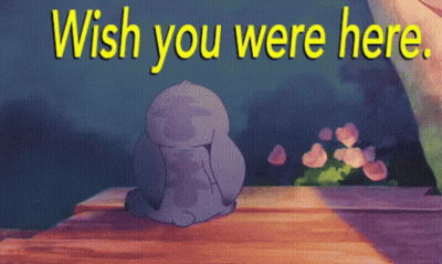 A Cartoon Character Sitting On A Wooden Dock With The Words Wish You Were Here GIF