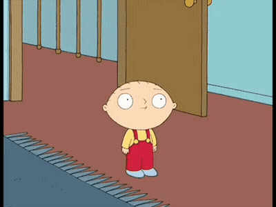 A Cartoon Character Standing In Front Of A Door Wearing Red Overalls GIF