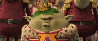 A Cartoon Character Wearing A Crown And A Shirt That Says ' King ' On It GIF